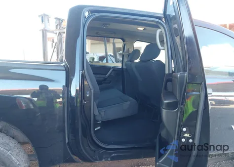 2014 Nissan Titan Pro-4X/S/Sl/Sv z USA, uszkodzony, nr VIN 1N6AA0EJ5EN509687